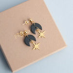 Load image into Gallery viewer, Celestial Gold Star Drop Earrings - midnight black
