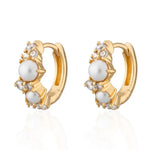 Load image into Gallery viewer, Pearl Huggie Earrings - gold
