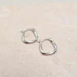 Load image into Gallery viewer, Silver Horseshoe Twist Hoop Earrings
