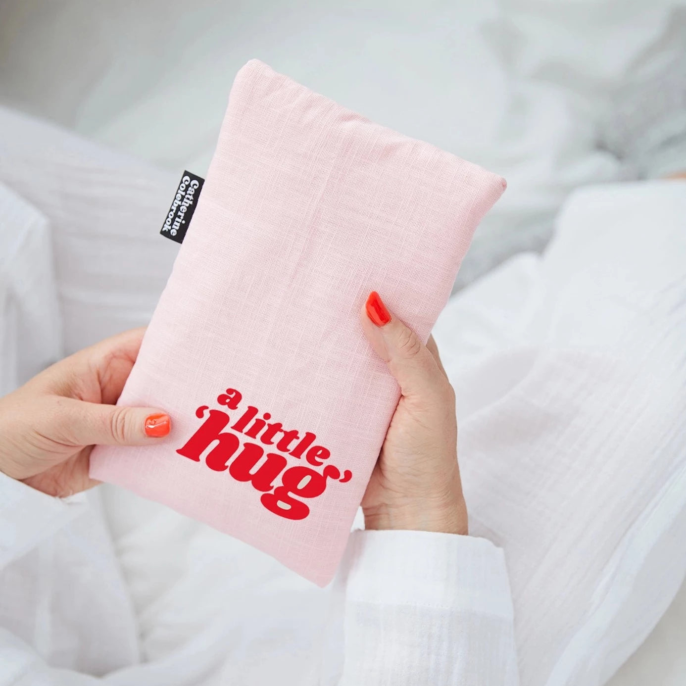 'A Little Hug' Hot Water Bottle - pink